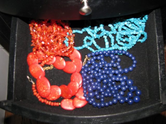 colorful beaded necklaces in my jewelry armoire