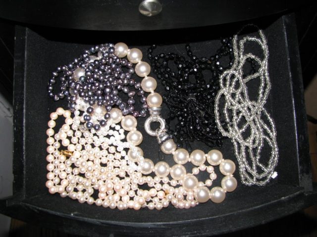costume pearl and beaded necklaces in my jewelry armoire