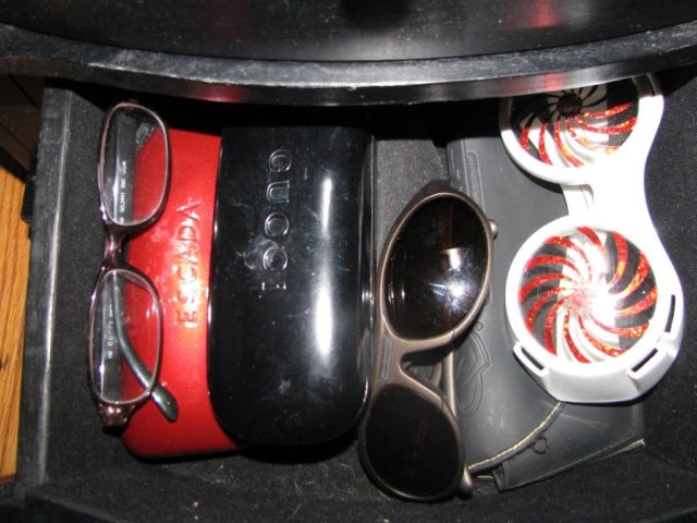 sunglasses in my jewelry armoire