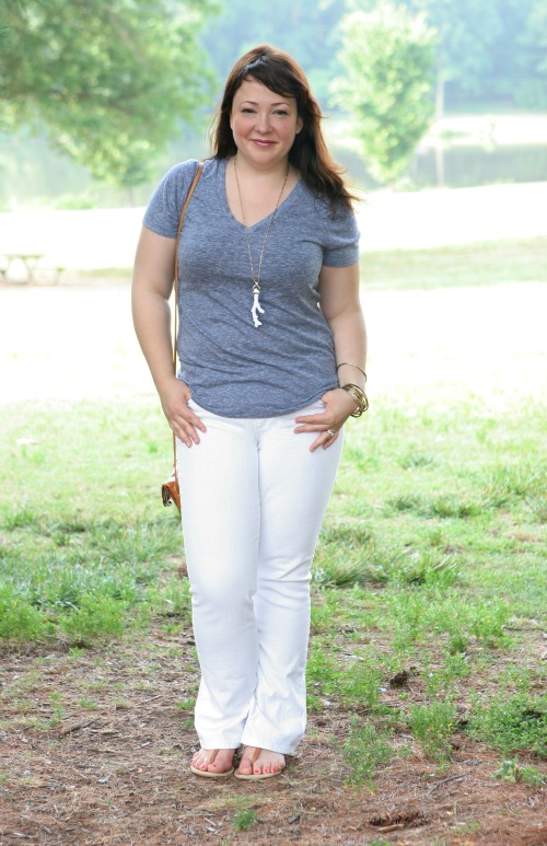 A Love Letter: Old Navy Vintage Tee Review 2 Woman in an Old Navy Vintage Tee v-neck in gray-blue with white bootcut jeans and a Stella and Dot coral pendant necklace