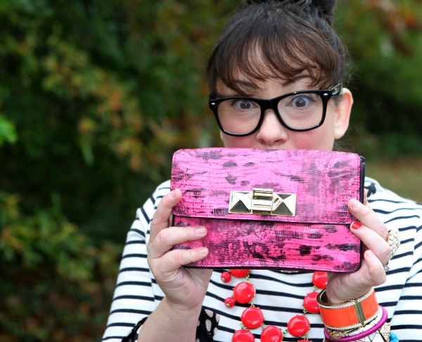 pink snakeskin clutch