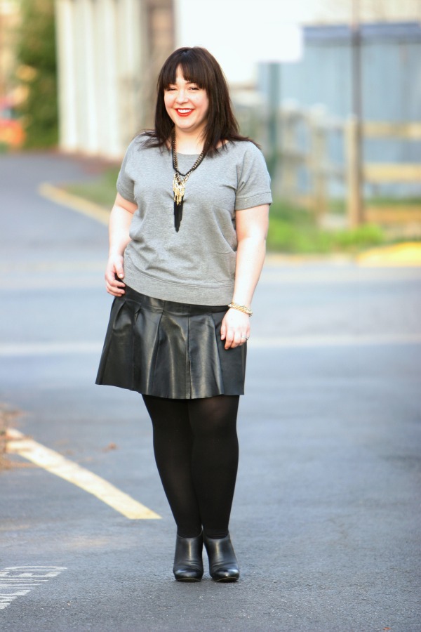 Alison Gary of Wardrobe Oxygen in a short sleeved Gap sweatshirt and a Halogen black leather drop waist pleated mini skirt 
