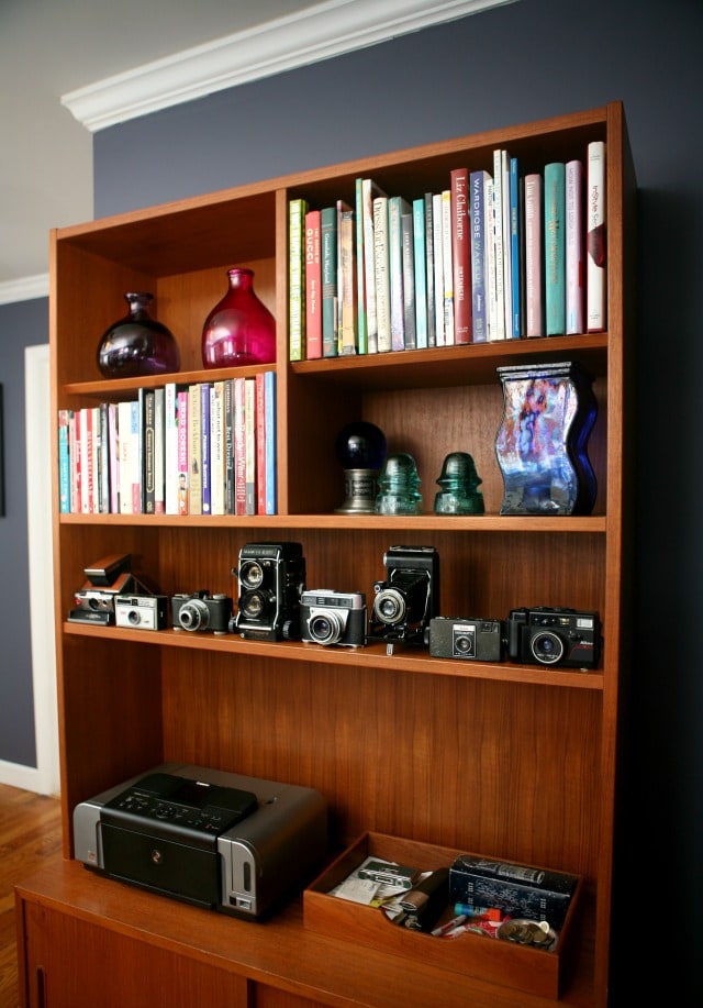 books in a mid century modern scandinavian bookcase in a home office