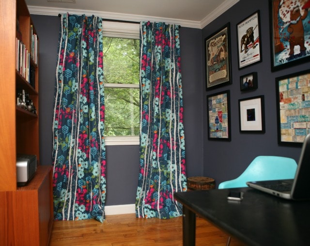 navy and magenta floral curtains in a home office