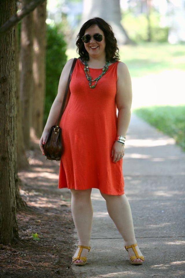 Eileen Fisher orange dress with turquoise bead necklace on Alison Gary of Wardrobe Oxygen