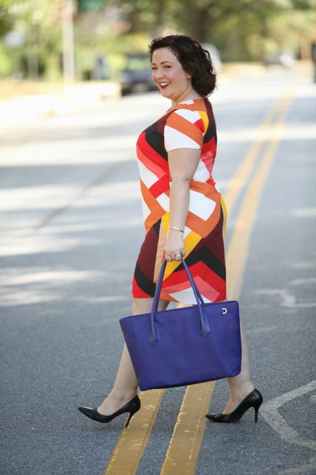 Wardrobe Oxygen wearing a Vince Camuto shift dress and Dagne Dover tote