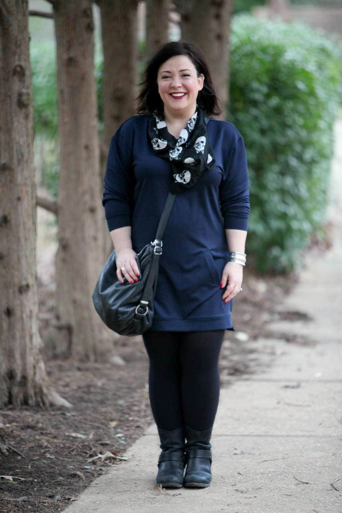 Wardrobe Oxygen, an over 40 fashion and personal style blog, featuring a navy sweatshirt dress and black harness boots