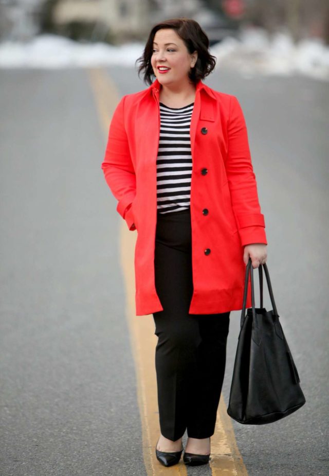 Wardrobe Oxygen wearing an orange Ann Taylor trench with black and white stripes