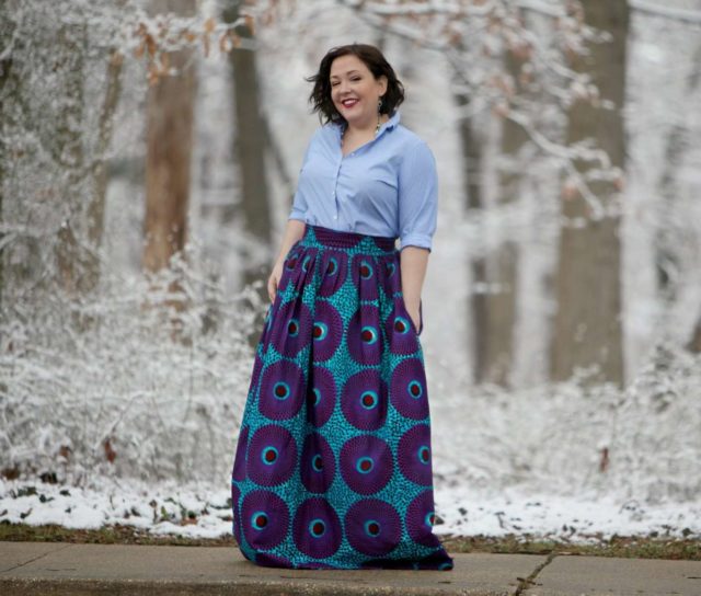 Wardrobe Oxygen wearing a Lands' End striped button front shirt with blue ankara maxi skirt