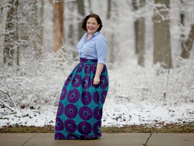 Wardrobe Oxygen wearing a Lands' End striped button front shirt with blue ankara maxi skirt