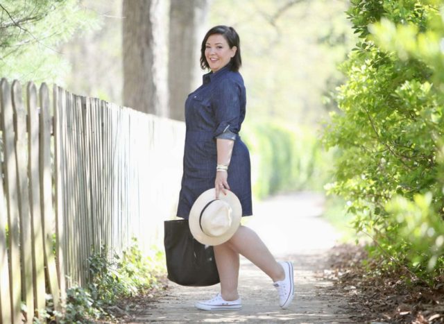 Over 40 fashion blog Wardrobe Oxygen in a Boden dress, Converse sneakers, and carrying an Adora Bags tote