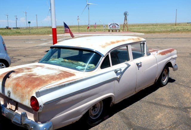 car outside midpoint cafe adrian texas