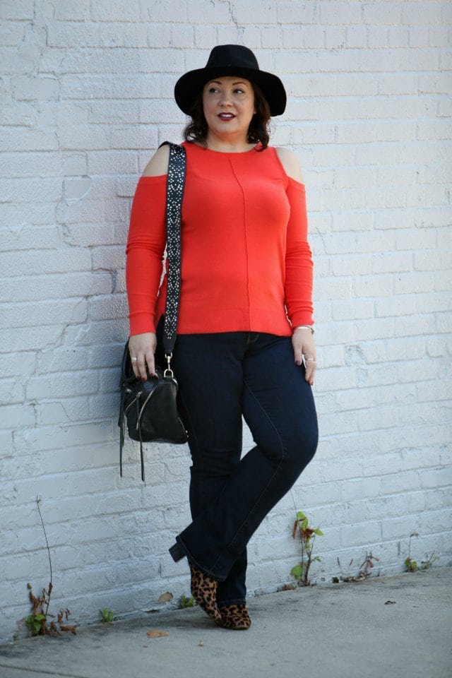 Wardrobe Oxygen, over 40 fashion blogger in JAG Jeans, Nine West leopard calfhair booties, and a Rebeccaa Minkoff moto bag with guitar strap