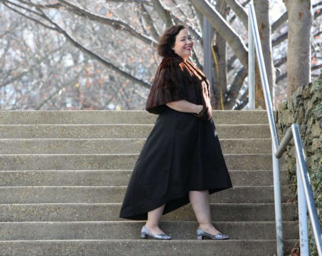 Wardrobe Oxygen in a vintage fur capelet, CityChic high-low evening dress and glitter pumps from J. Renee