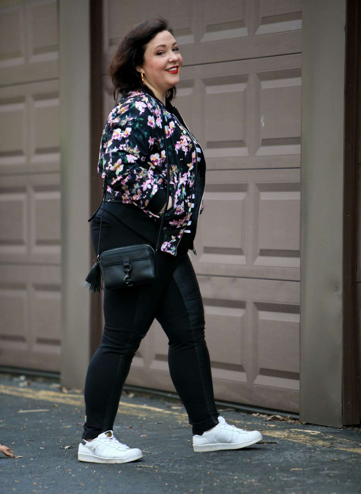 Wardrobe Oxygen, over 40 fashion blogger in floral bomber from Gwynnie Bee and faux leather front ponte pants
