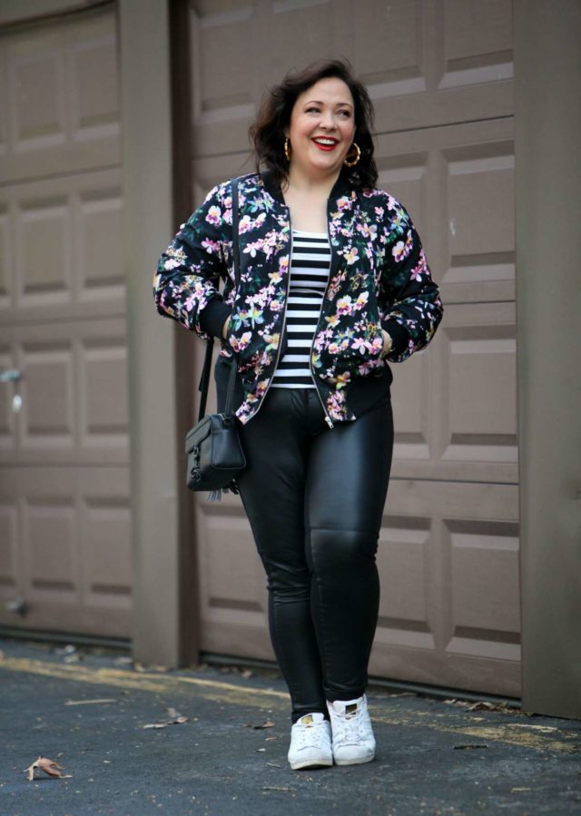 Wardrobe Oxygen, over 40 fashion blogger in floral bomber from Gwynnie Bee and faux leather front ponte pants