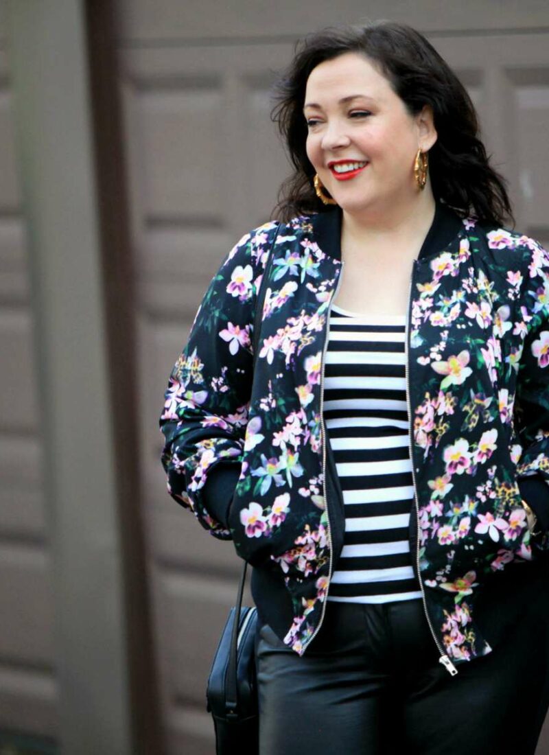 Wardrobe Oxygen, over 40 fashion blogger in floral bomber from Gwynnie Bee and faux leather front ponte pants