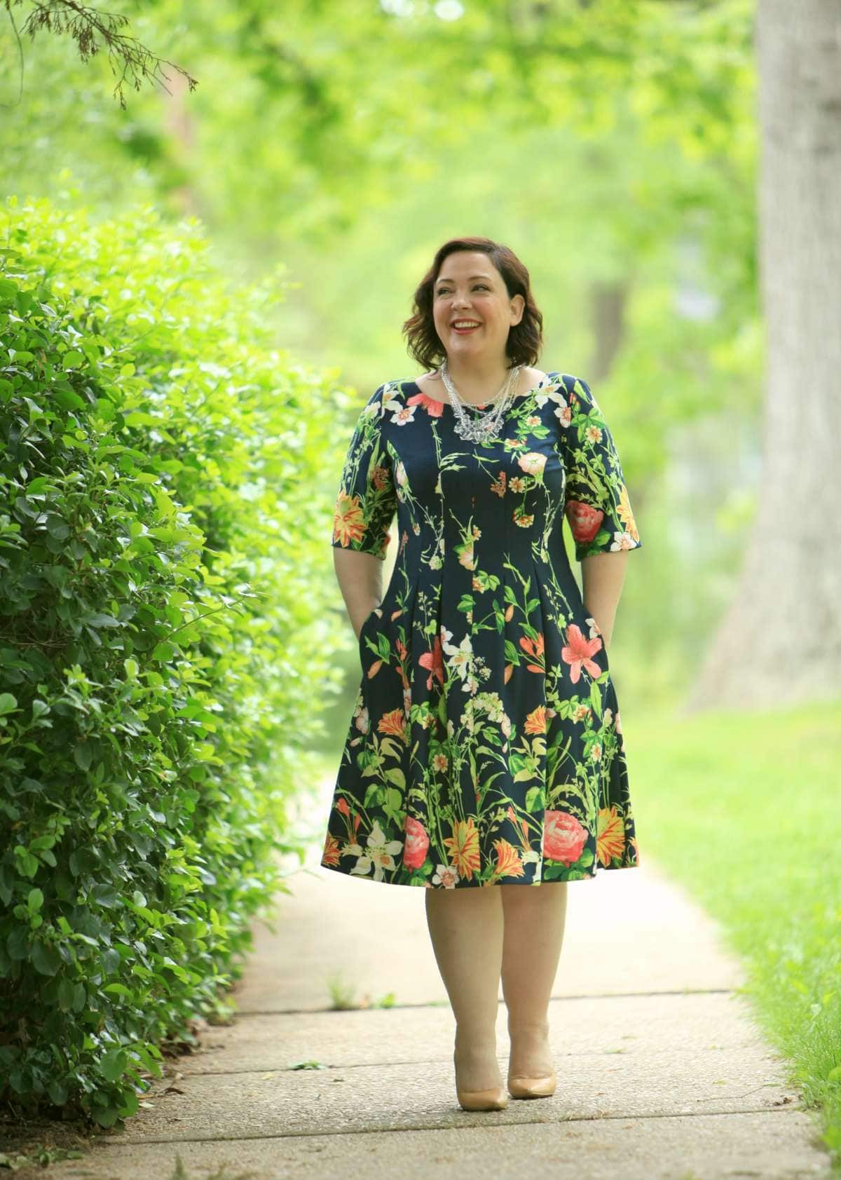 Wardrobe Oxygen in a Gabby Skye floral fit and flare dress via Gwynnie Bee with a Baublebar necklace and Nine West pumps