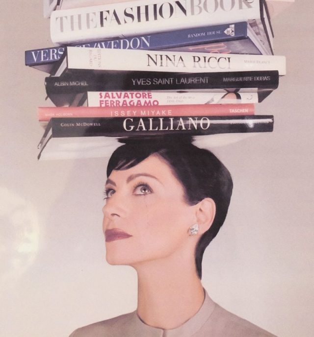 Joan Juliet Buck with books on her head