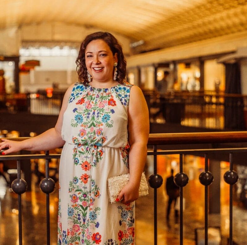 Gwynnie Bee June Featured Influencer Wardrobe Oxygen in a white and floral maxi dress from Sandra Darren