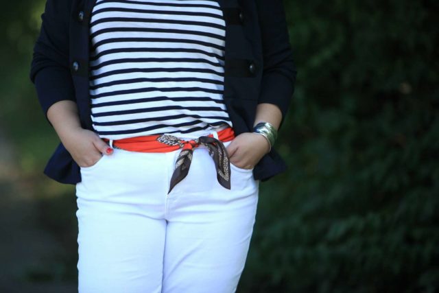 Wardrobe Oxygen wearing the cabi Deidre Scarf as a belt with white jeans, a Breton top, and the cabi In The Band jacket