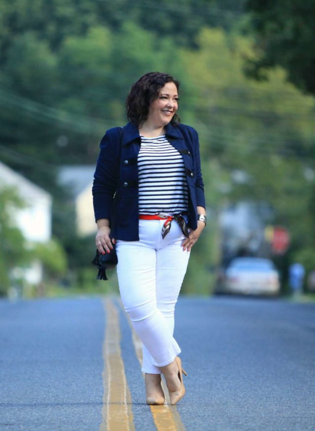 Wardrobe Oxygen wearing the cabi In The Band Jacket with a Breton tee, white cropped jeans, nude pumps, and the cabi Deidre Scarf worn as a belt