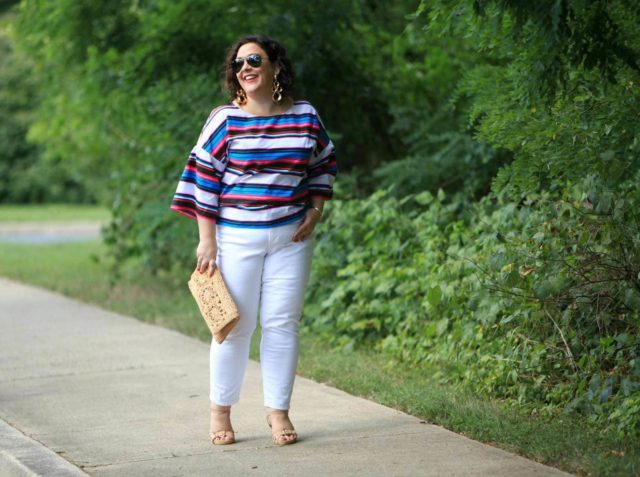 Wardrobe Oxygen in a candy striped cotton bell sleeve blouse from Vince Camuto with white Talbots ankle jeans, Aerosoles sandals, and a raffia clutch