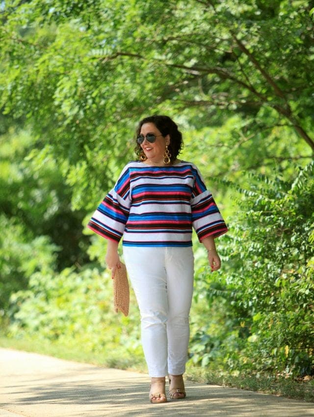 Wardrobe Oxygen in a candy striped cotton bell sleeve blouse from Vince Camuto with white Talbots ankle jeans, Aerosoles sandals, and a raffia clutch