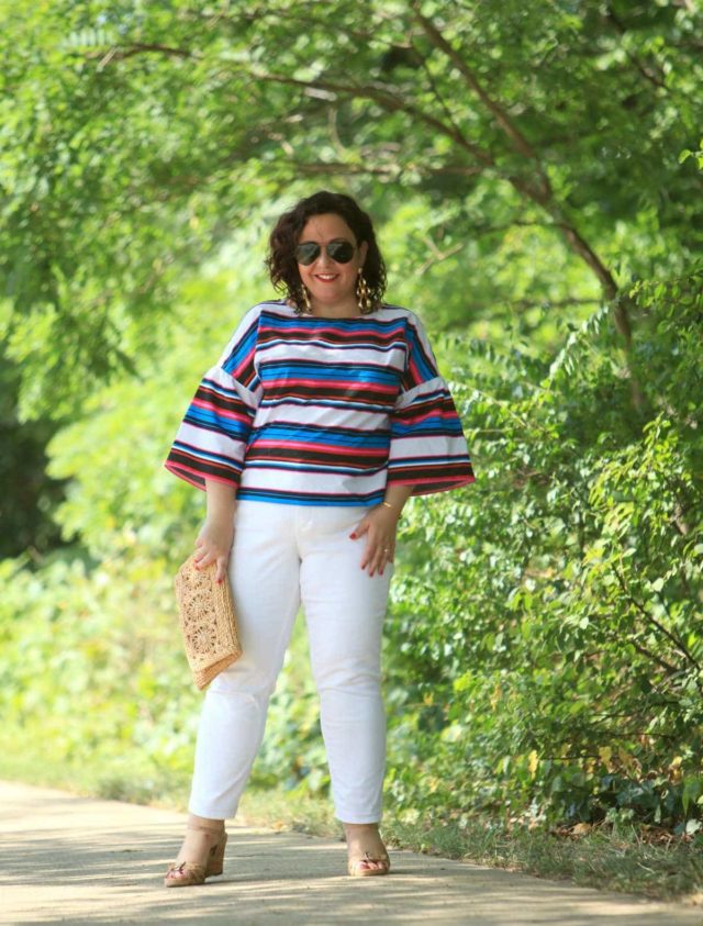 Wardrobe Oxygen in a candy striped cotton bell sleeve blouse from Vince Camuto with white Talbots ankle jeans, Aerosoles sandals, and a raffia clutch