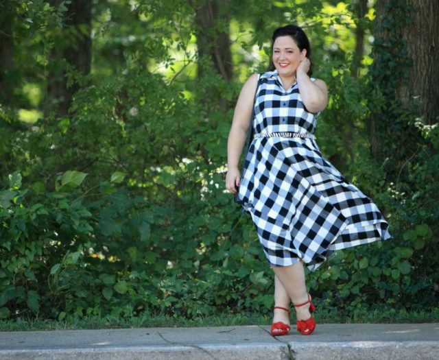 Wardrobe Oxygen in a black and white gingham dress from Gwynnie Bee with a cabi zebra calfhair belt and Naturalizer Adelle red suede platform sandals