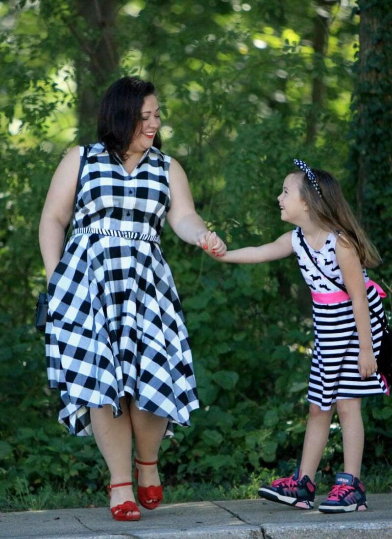Wardrobe Oxygen in a black and white gingham dress from Gwynnie Bee with a cabi zebra calfhair belt and Naturalizer Adelle red suede platform sandals