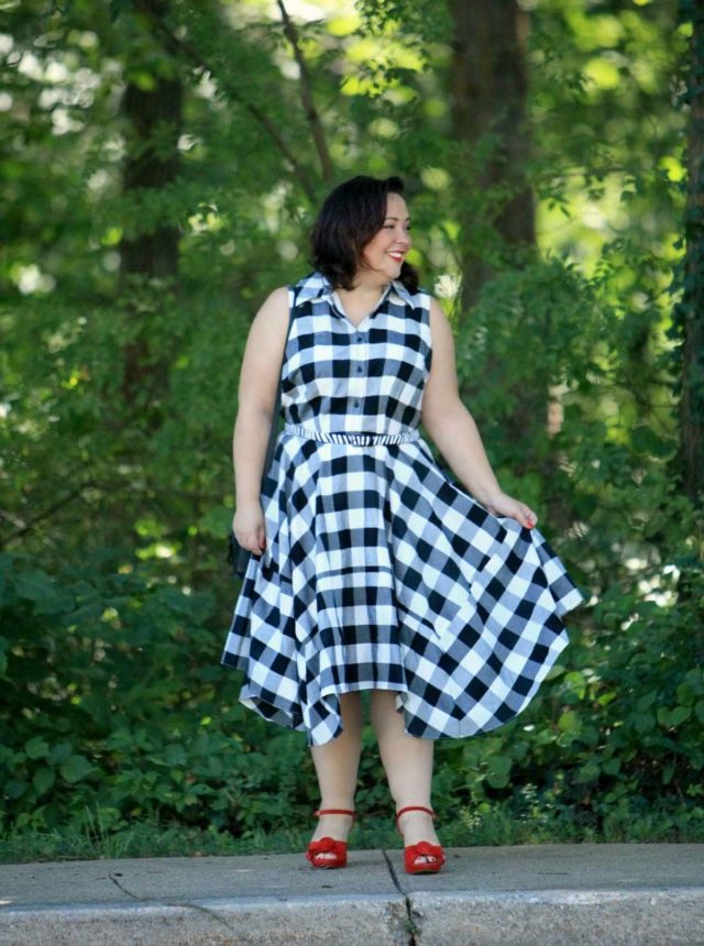 Wardrobe Oxygen in a black and white gingham dress from Gwynnie Bee with a cabi zebra calfhair belt and Naturalizer Adelle red suede platform sandals