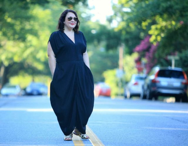 Wardrobe Oxygen in the Myne LA 'Heidi' dress in black silk with gold gladiator sandals and gold Ray-Ban aviators