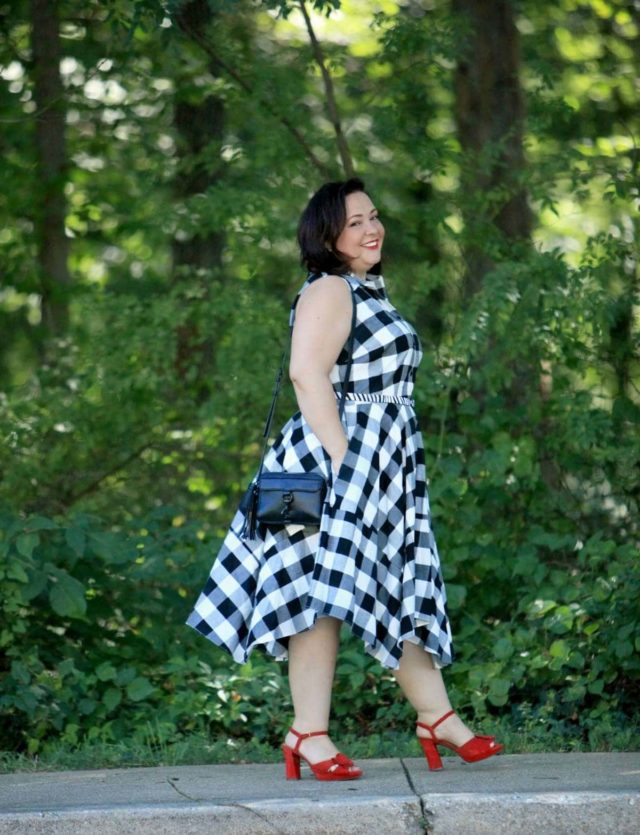 Wardrobe Oxygen in a black and white gingham dress from Gwynnie Bee with a cabi zebra calfhair belt and Naturalizer Adelle red suede platform sandals
