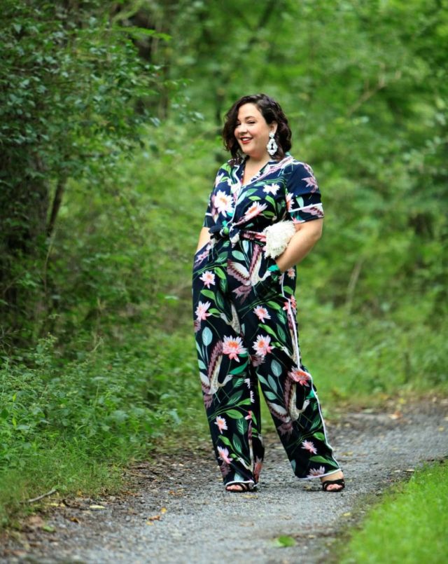 Wardrobe Oxygen in daytime pajamas in a navy botanical print by ELOQUII styled with J. Crew earrings and a Loeffler Randall fringe clutch