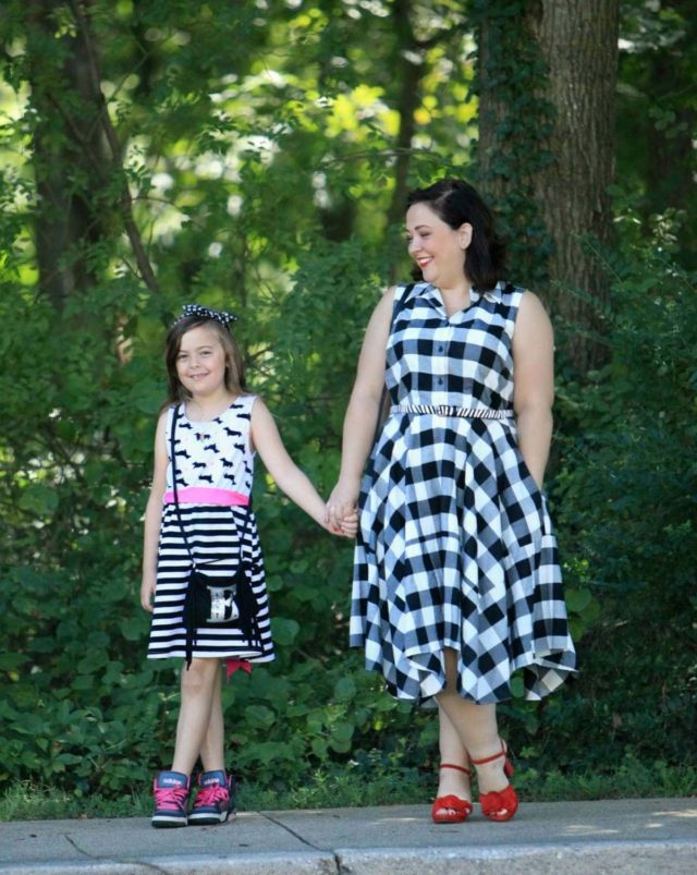 Wardrobe Oxygen in a black and white gingham dress from Gwynnie Bee with a cabi zebra calfhair belt and Naturalizer Adelle red suede platform sandals