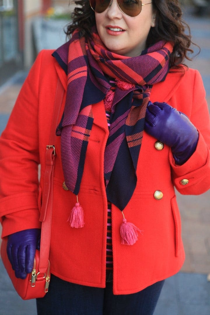 Wardrobe Oxygen in a red Talbots peacoat, plaid scarf, and purple leather gloves