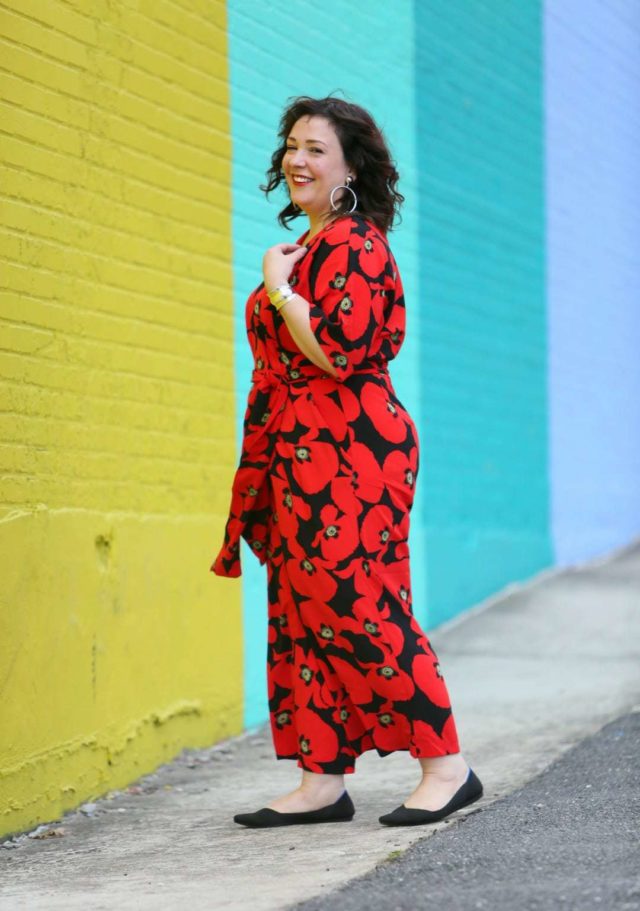 Wardrobe Oxygen in a red floral jumpsuit from ELOQUII with Rothy's flats