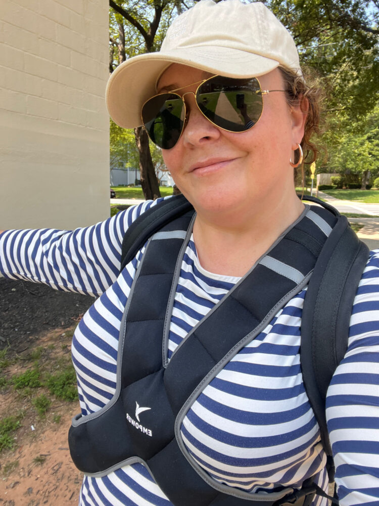I’ve Owned the Dagne Dover Dakota Backpack for Over 5 Years: Here’s My Honest Review 4 woman in midlife rucking with a weighted vest and a dagne dover dakota backpack full of weight