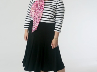 French Chic: A striped top and swishy skirt get a pop of color with a pink patterned scarf. Chico's Travelers Collection capsule wardrobe: Striped tee, Travelers Skirt, and scarf