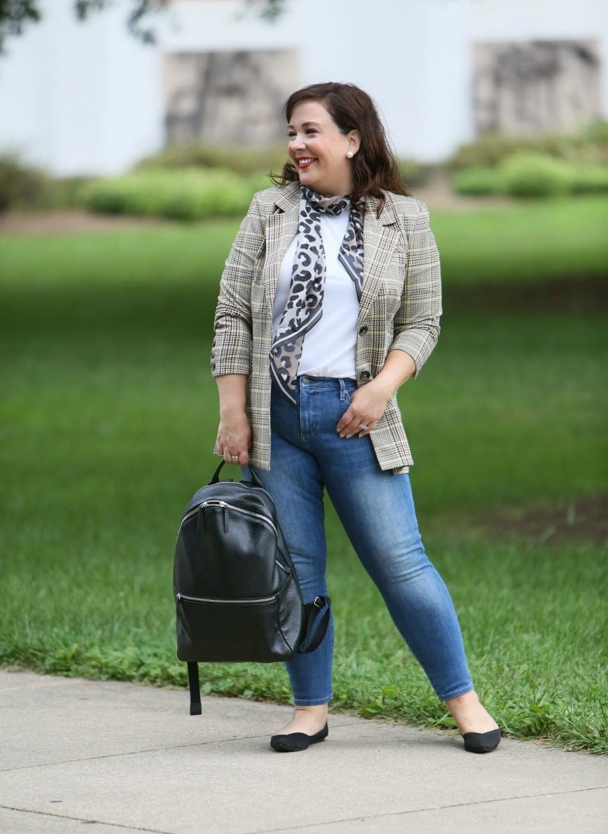 Wardrobe Oxygen in the cabi Pastime jacket and leopard scarf styled with a Universal Standard t-shirt, Banana Republic jeans, Rothy's flats, and the ECCO SP3 backpack for fall