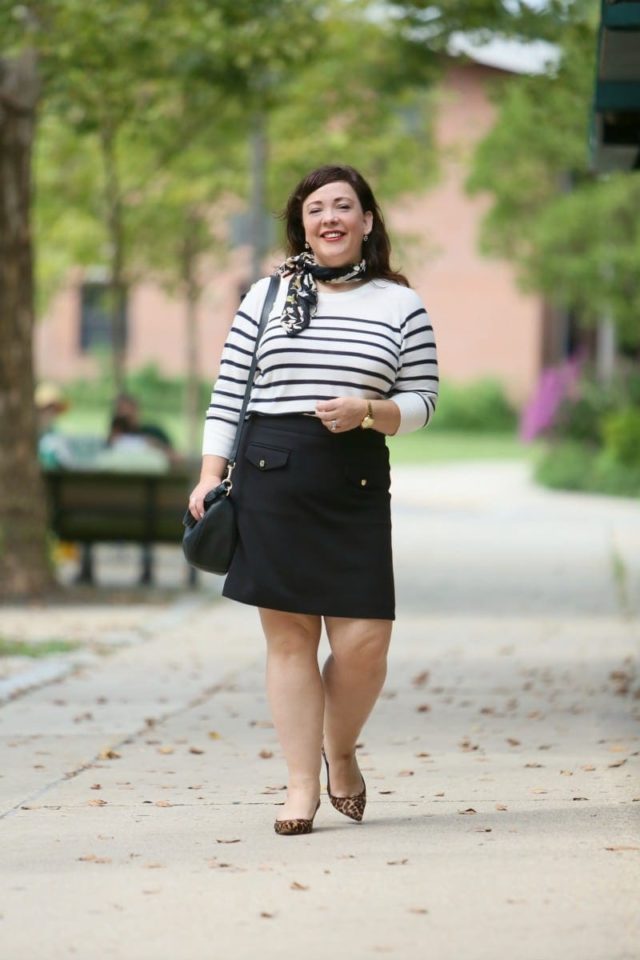 Wardrobe Oxygen in a Breton stripe top and black ponte knit skirt from LOFT styled with a floral scarf and leopard kitten heel pumps