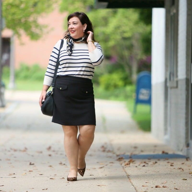 Wardrobe Oxygen in a Breton stripe top and black ponte knit skirt from LOFT styled with a floral scarf and leopard kitten heel pumps
