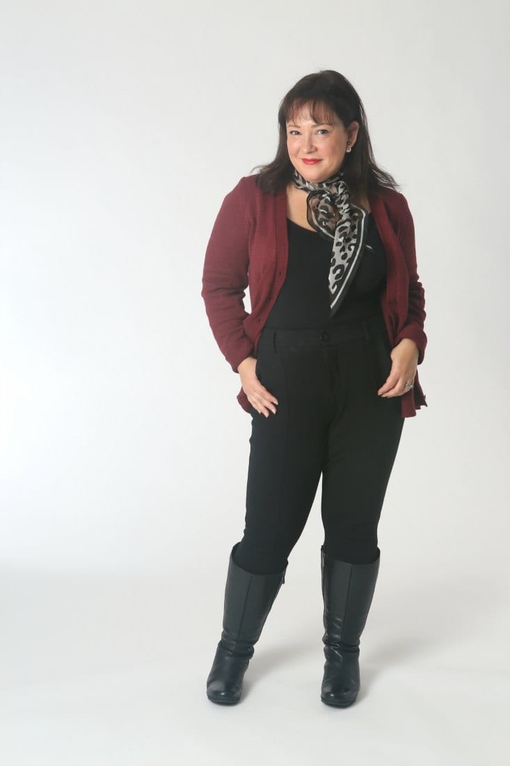 The cabi Catch Cardigan with the leopard scarf, black tank and pants, and black leather knee-high boots.