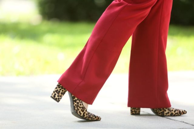 Wardrobe Oxygen in a red pantsuit from Talbots styled with leopard block heel pumps