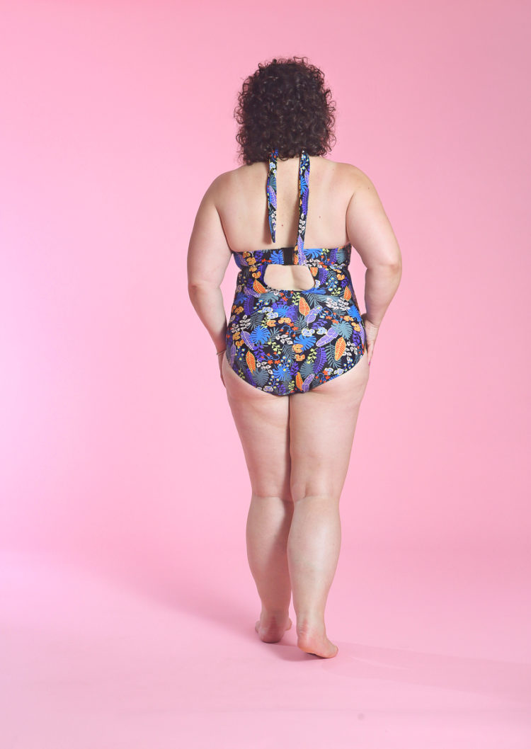 image of Wardrobe Oxygen wearing Santiago Floral Bandeau tummy control swimsuit from Figleaves