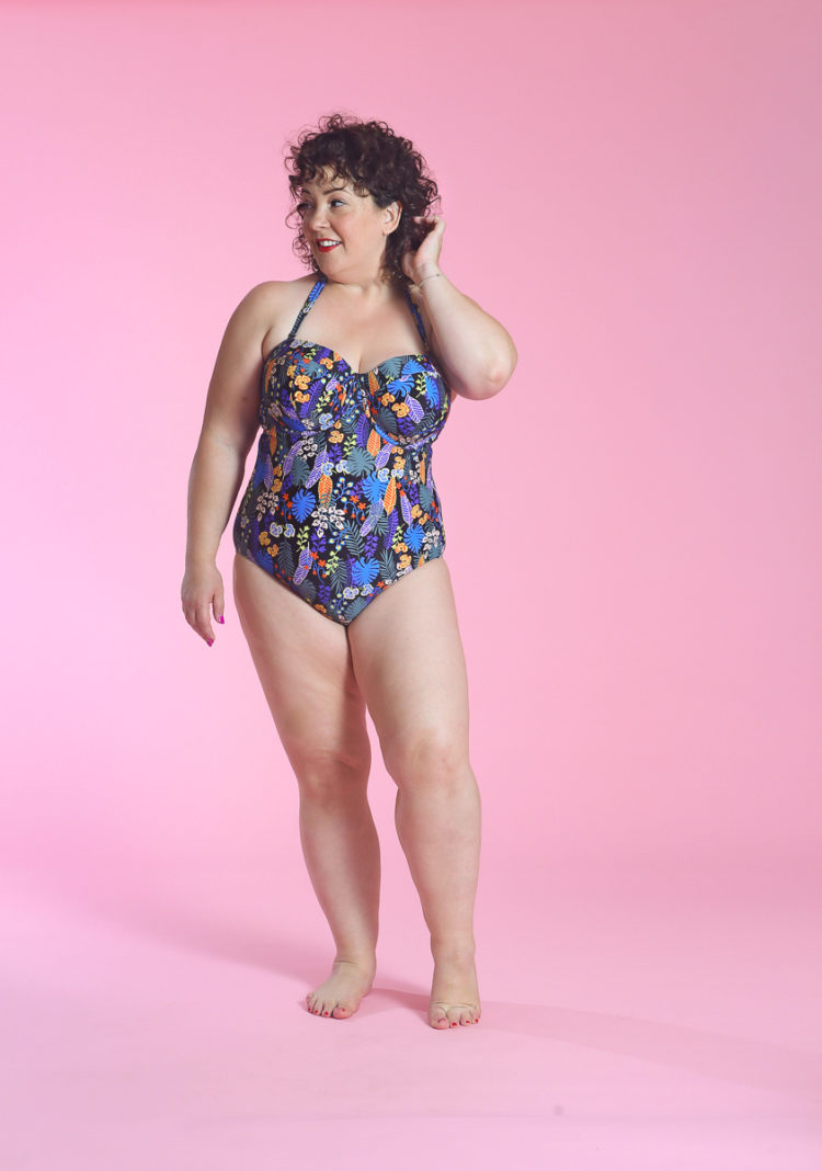 image of Wardrobe Oxygen wearing Santiago Floral Bandeau tummy control swimsuit from Figleaves