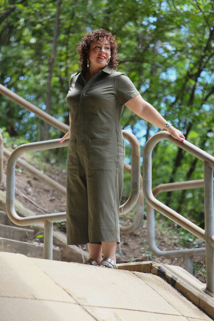 Wardrobe Oxygen in the Universal Standard Kate Twill Jumpsuit in green with silver Birkenstocks and the Jenny Bird Cober Hoops in Silver