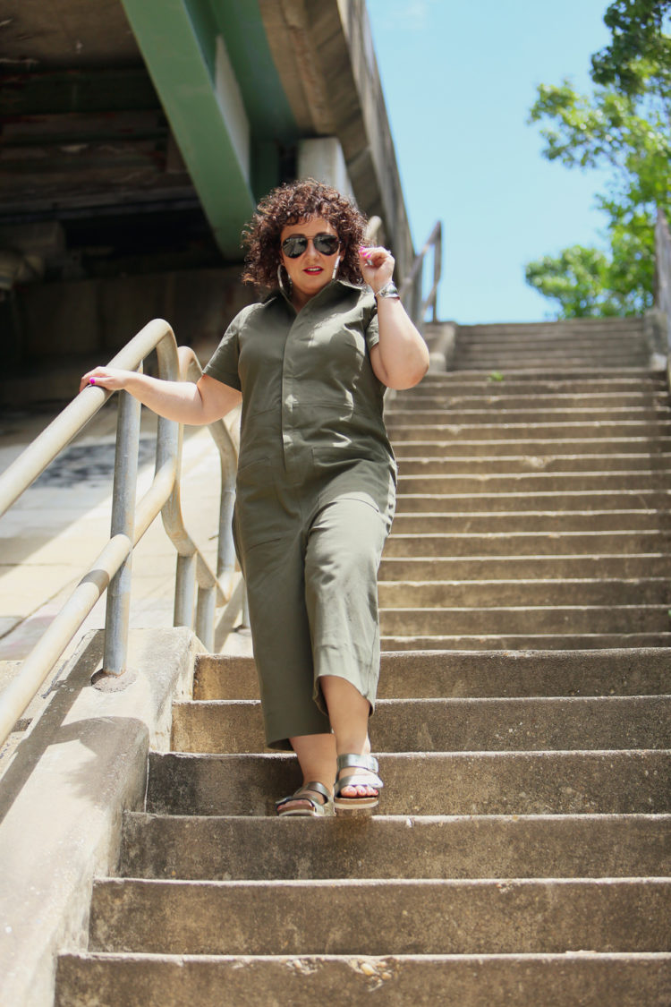 Wardrobe Oxygen in the Universal Standard Kate Twill Jumpsuit in green with silver Birkenstocks and the Jenny Bird Cober Hoops in Silver