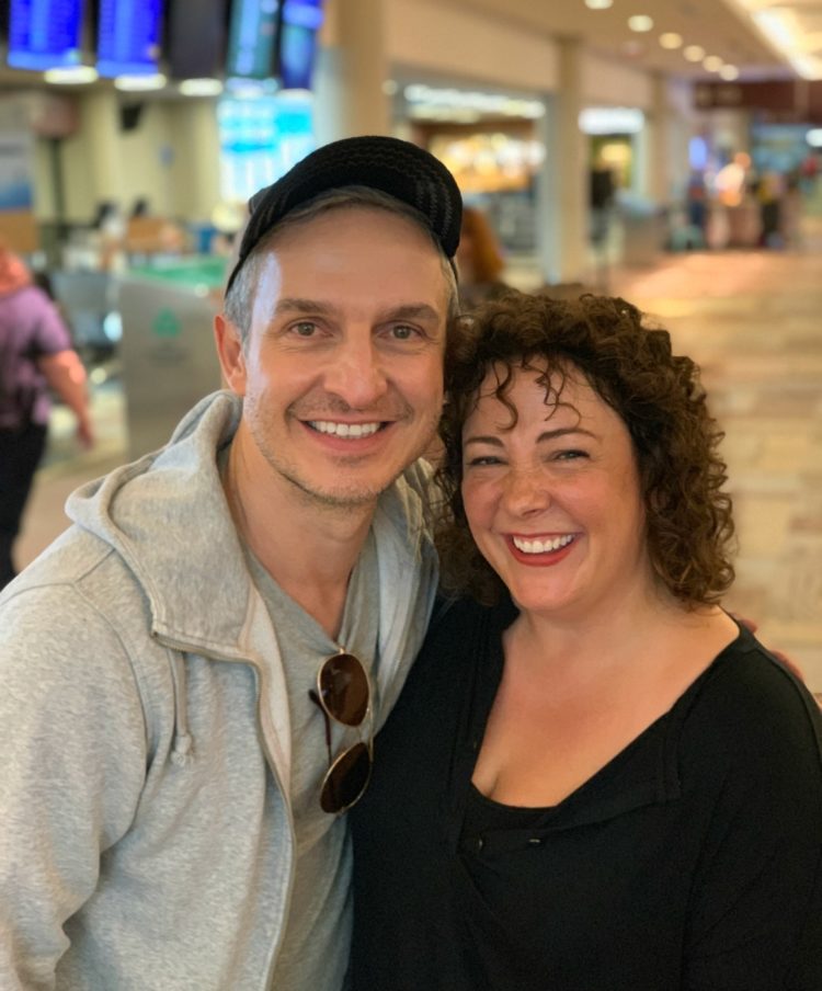 Daniele and Alison smiling for the camera at the Nashville airport